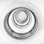 Intricate spiral staircase view from below in London's iconic architecture