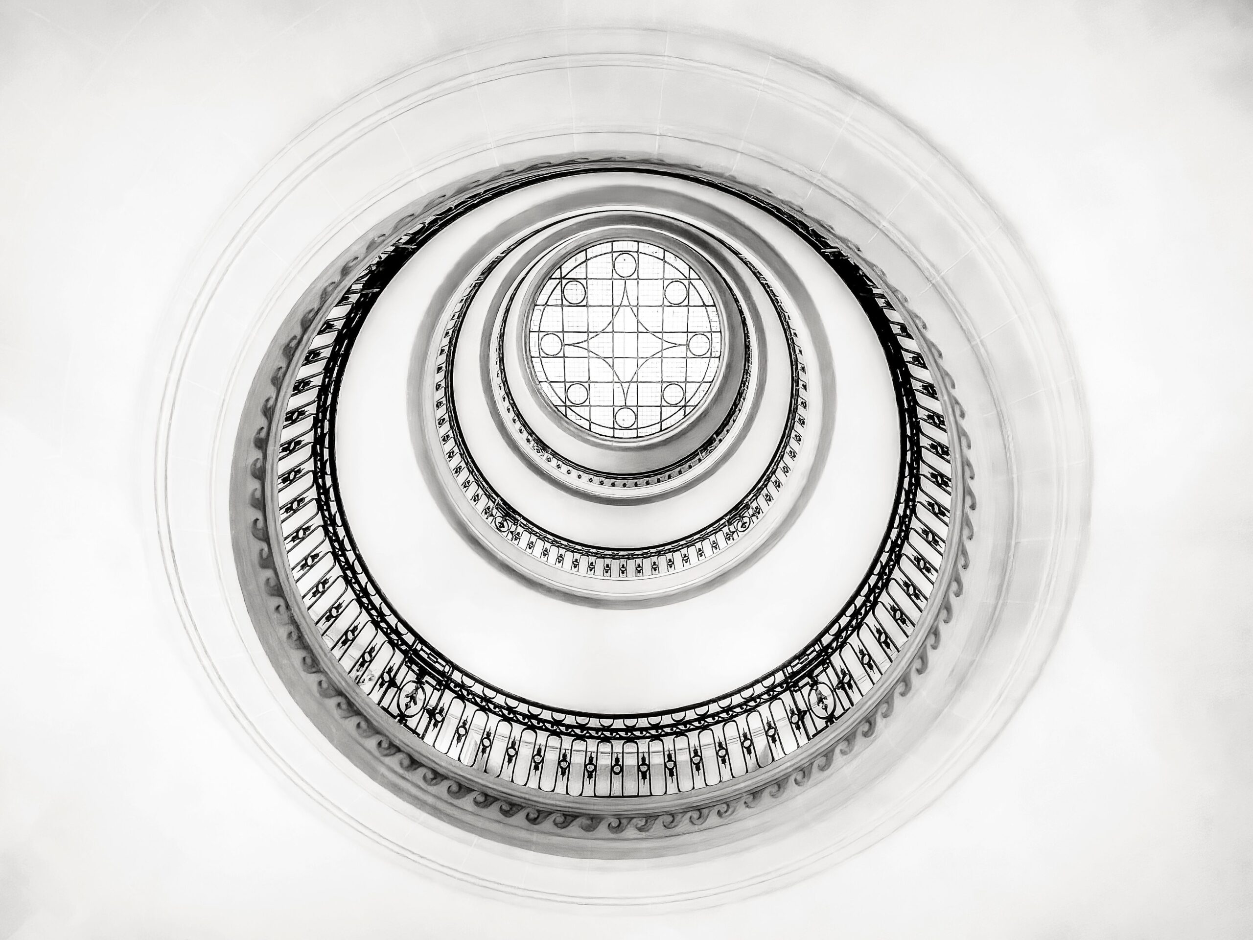 Intricate spiral staircase view from below in London's iconic architecture