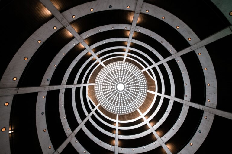 A stunning spiral staircase in Hamburg offers a mesmerizing architectural view from below.