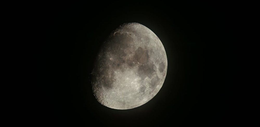 pexels-photo-33326256-33326256 Capture of the waxing gibbous moon against a dark sky, revealing detailed lunar surface.